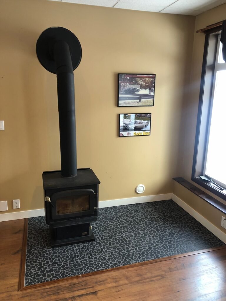 Cobblestone Hearth Under Wood Stove