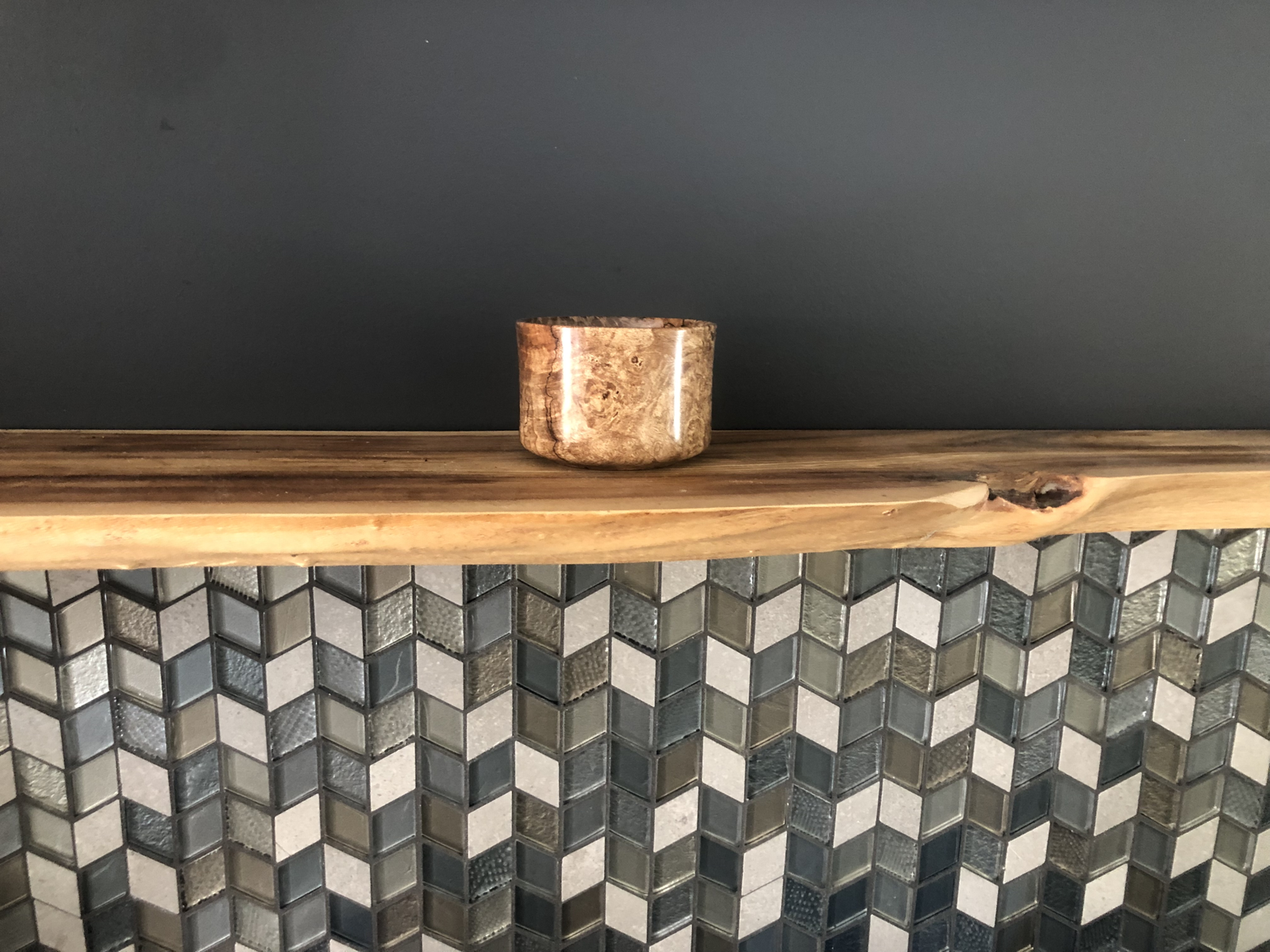 Live-edge mantles and burlwood bowl